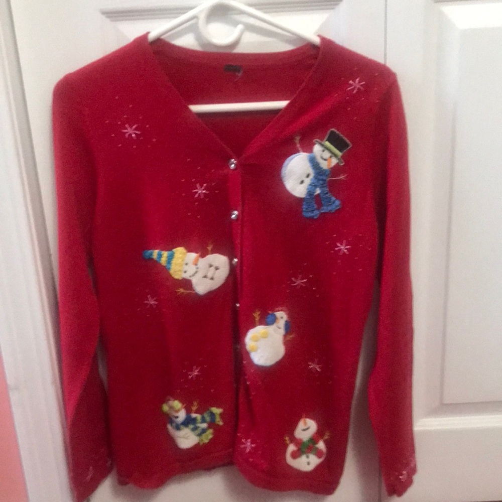 This is a beautiful Snowman / Christmas cardigan sweater only worn a few times.